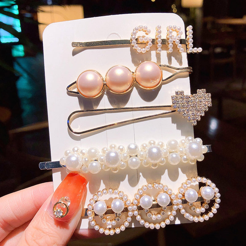 Girl's Simple Pearl Clip Set hair accessories by cj; 8-piece pearl and rhinestone clip assortment