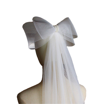 Super Fairy Elastic Mesh Bow Bridal Veil by CJ with large mesh bow, pearl centerpiece, and flowing tulle veil