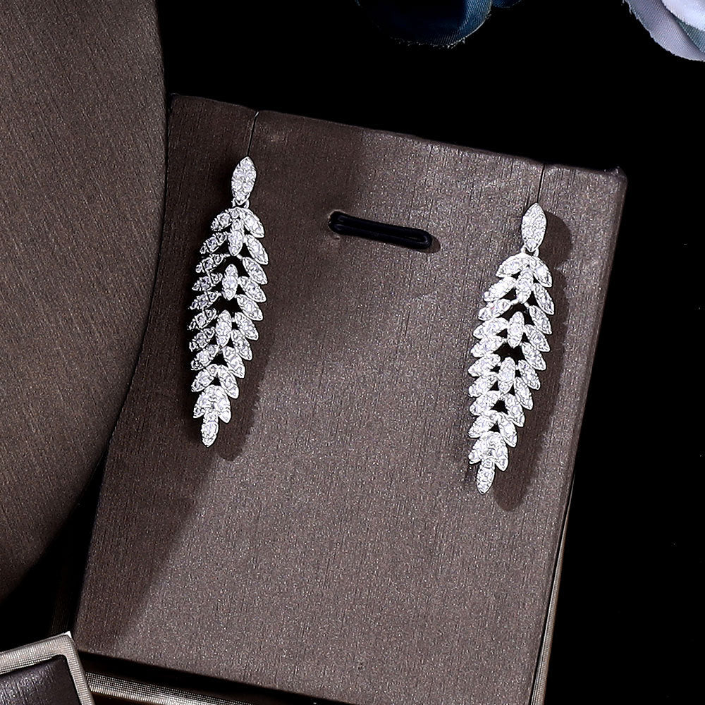Pair of silver-tone leaf-drop earrings with clear zircon crystals