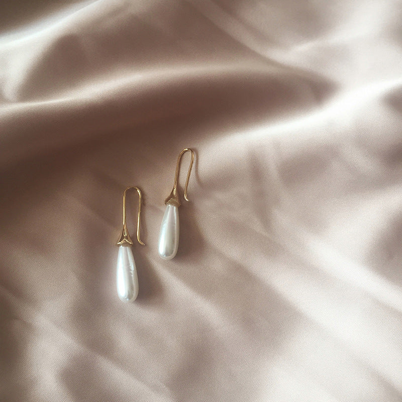 Waterdrop pearl simple personality earrings by edenista