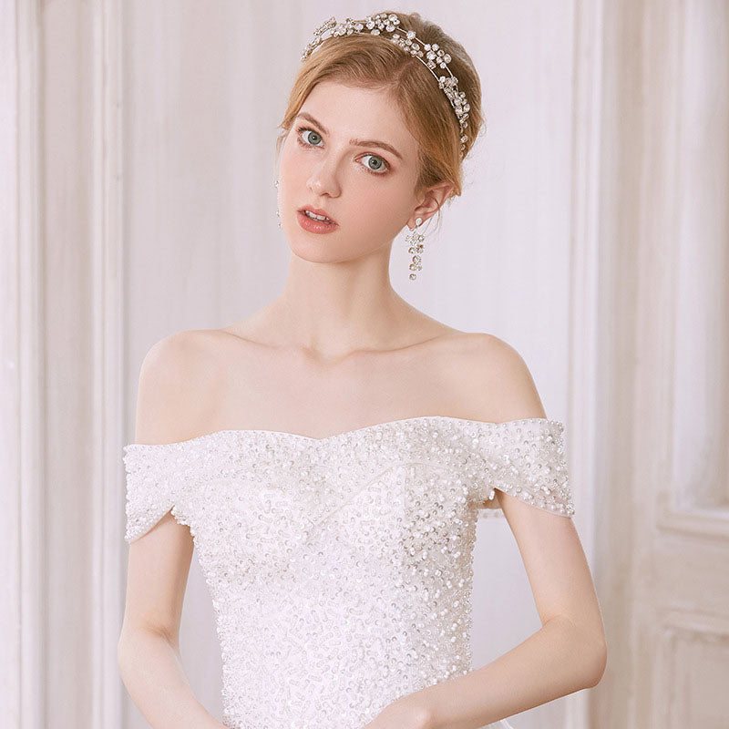 Bridal hair accessories set with clear crystal headpiece and matching drop earrings