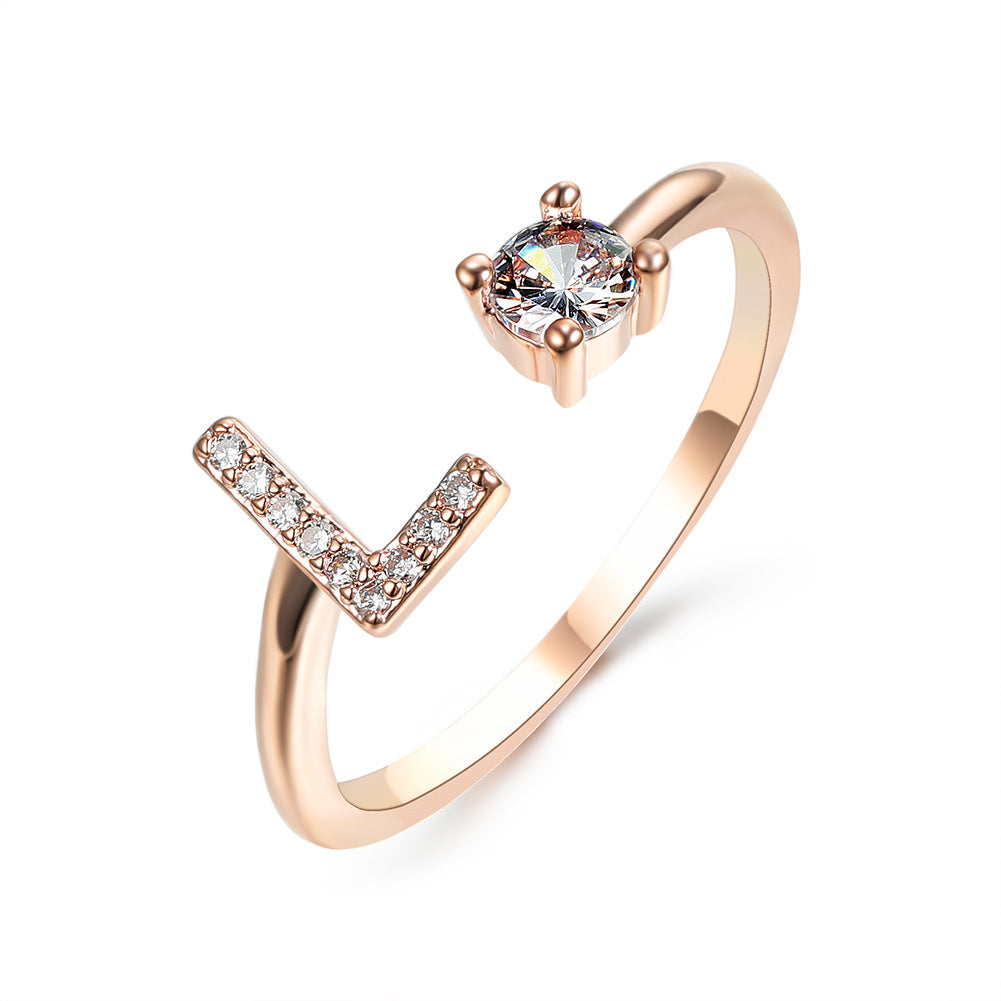 Rose gold adjustable initial L ring with pave diamonds and a solitaire stone for women