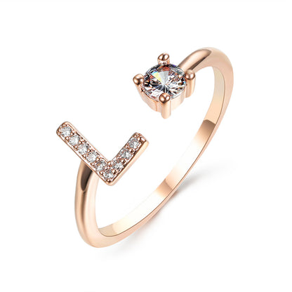 Rose gold adjustable initial L ring with pave diamonds and a solitaire stone for women