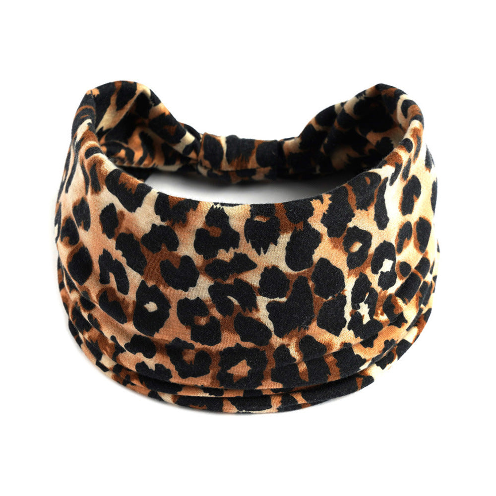 Yoga headband leopard print from cj brand, soft plush fabric.