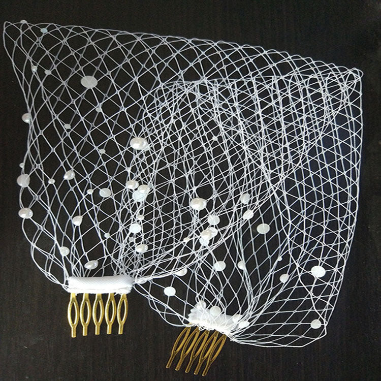 Bridal veil with pearl-dotted white mesh and two gold-tone hair combs