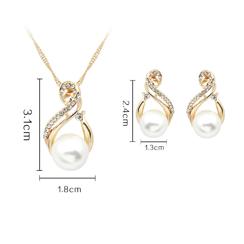 Pearl necklace and matching earrings set in gold-tone with crystal accents; 3-piece jewelry set