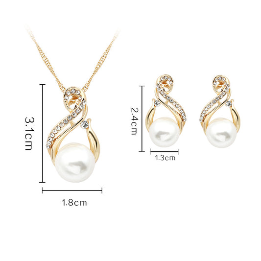 Pearl necklace and matching earrings set in gold-tone with crystal accents; 3-piece jewelry set