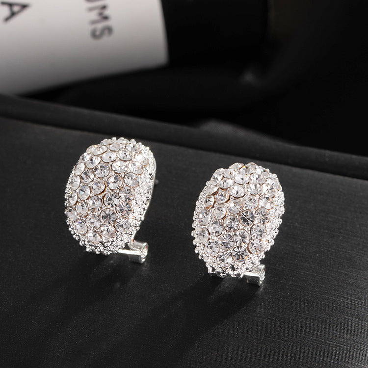 Pair of crystal ear-button stud earrings, silver-tone with rhinestone clusters