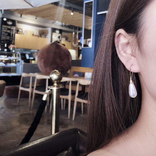 Waterdrop pearl simple personality earrings by edenista
