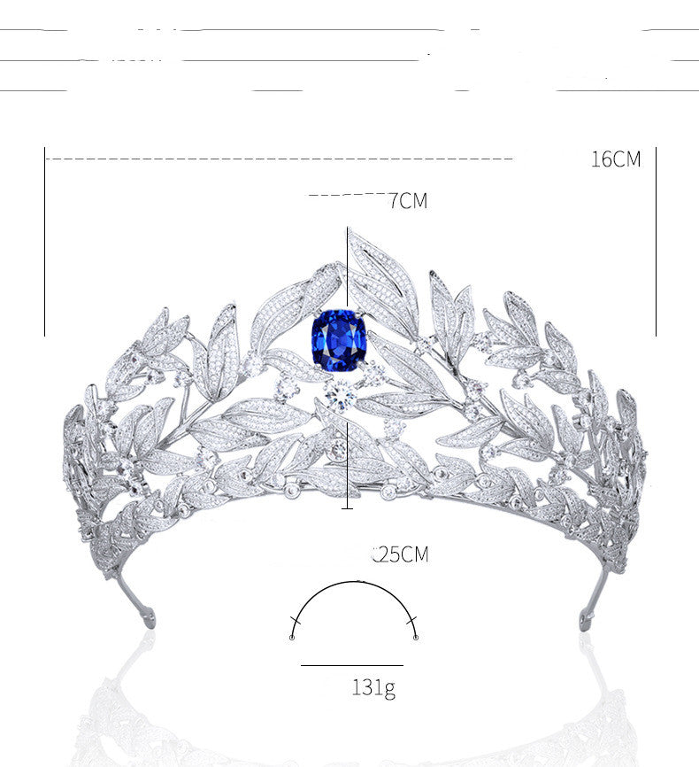 Sapphire crown tiara by cj with copper micro inlay, blue sapphire centerpiece and zircon leaf accents.