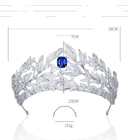 Sapphire crown tiara by cj with copper micro inlay, blue sapphire centerpiece and zircon leaf accents.