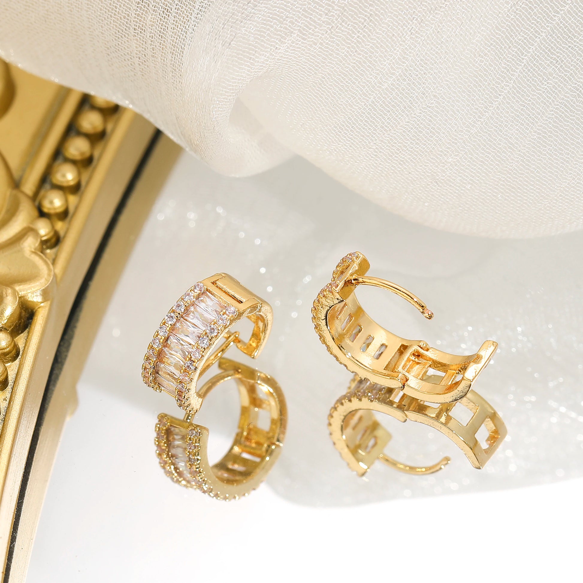 Gold-tone round rhinestone ear hoops with pave crystals, by Edenista
