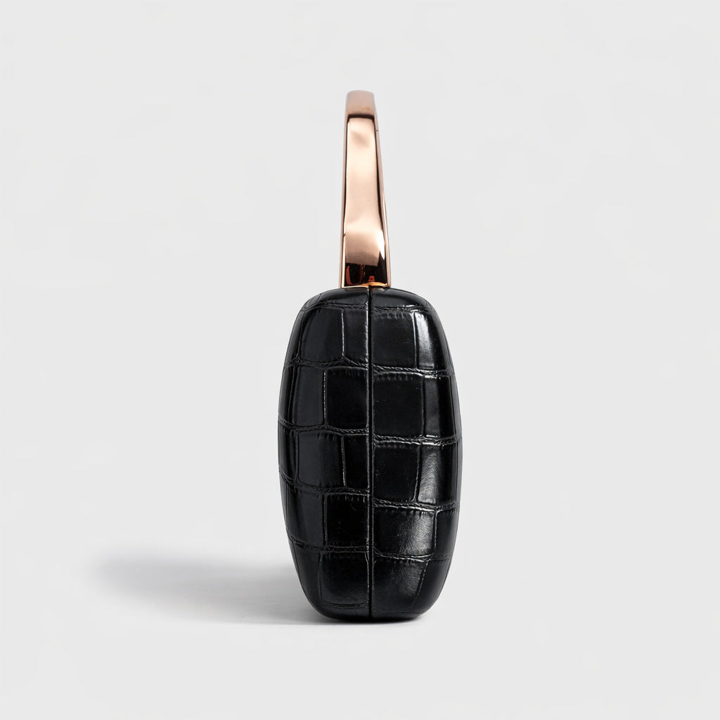 Black crocodile-pattern PU evening clutch with a rose-gold curved handle.