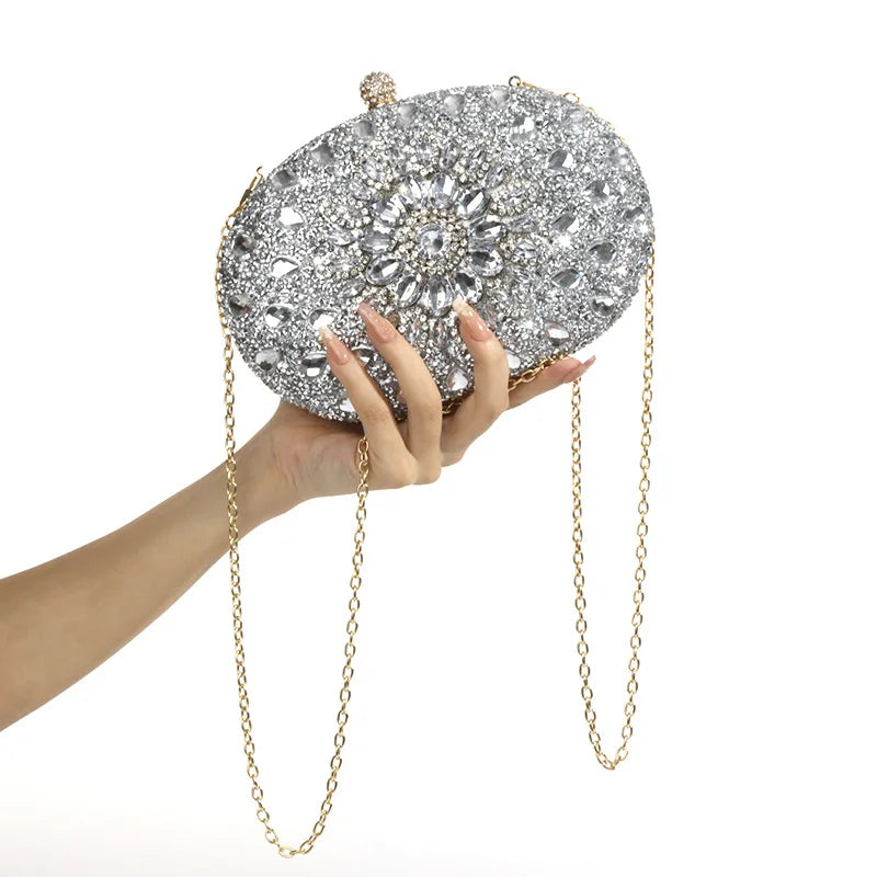 Edenista luxury glitter evening bag; crystal-encrusted silver clutch with gold chain strap.