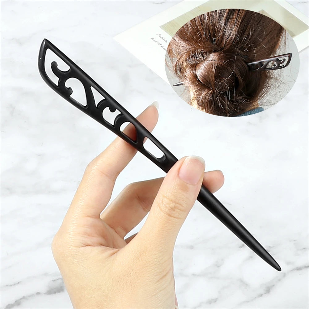 Hair stick black Chinese ethnic-style with ornamental cutouts for bun hairstyles