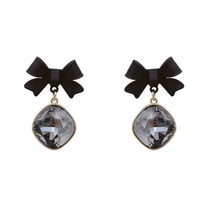 Elegant black bow-tie drop earrings, pair with clear grey cushion-cut gemstones, gold-tone alloy setting