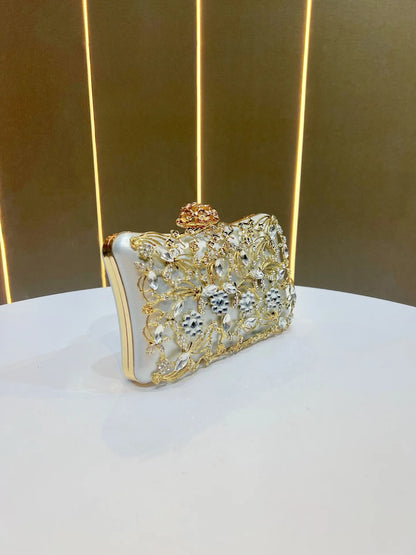 Edenista diamond-embellished banquet clutch, white satin with gold floral crystal filigree