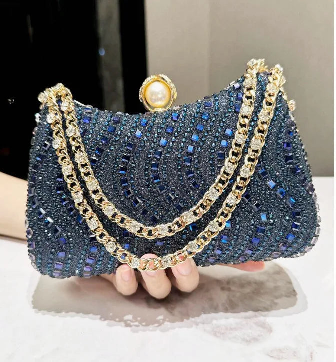 Evening clutch Edenista blue rhinestone inlay with gold-tone chain strap