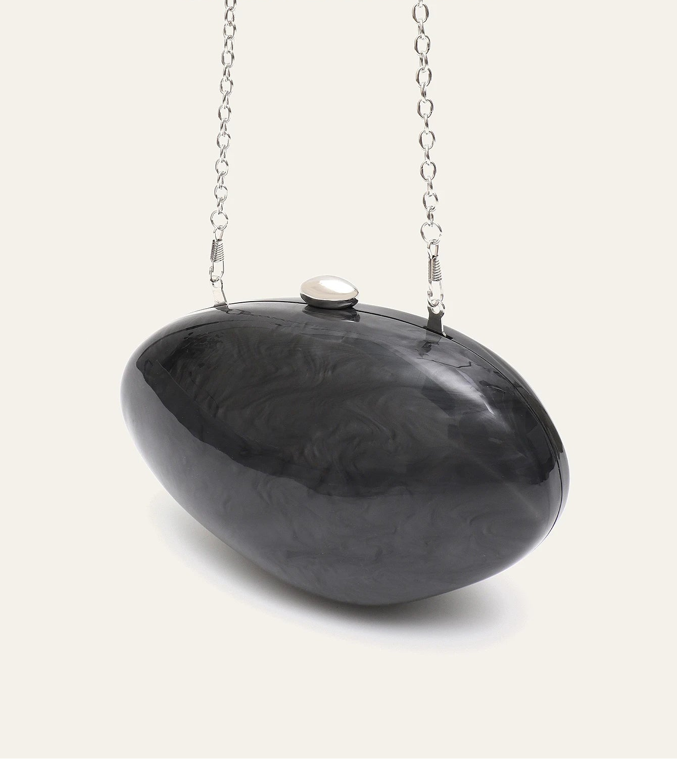 Edenista shell-shaped acrylic clutch with long silver chain, black glossy finish and pearl clasp