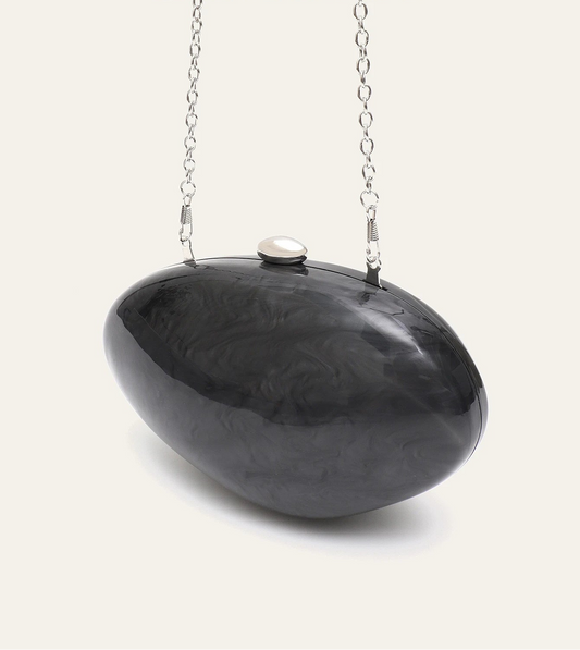 Edenista shell-shaped acrylic clutch with long silver chain, black glossy finish and pearl clasp