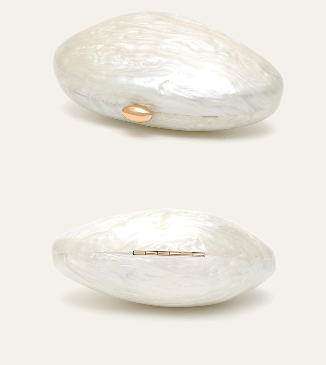 Shell-shaped acrylic clutch by Edenista, pearl-white with gold-tone oval clasp