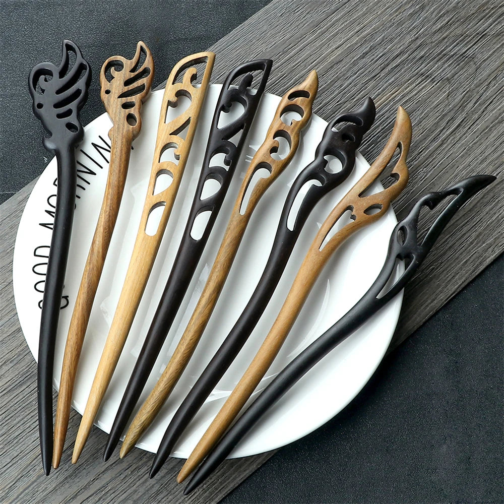 Chinese ethnic style hair sticks set of nine in natural wood and black tones with carved leaf tops Edenista