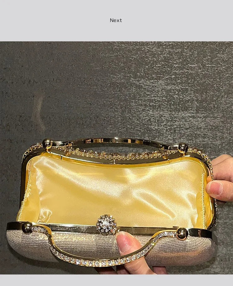Diamond evening clutch bag with gold satin interior and crystal-embellished clasp