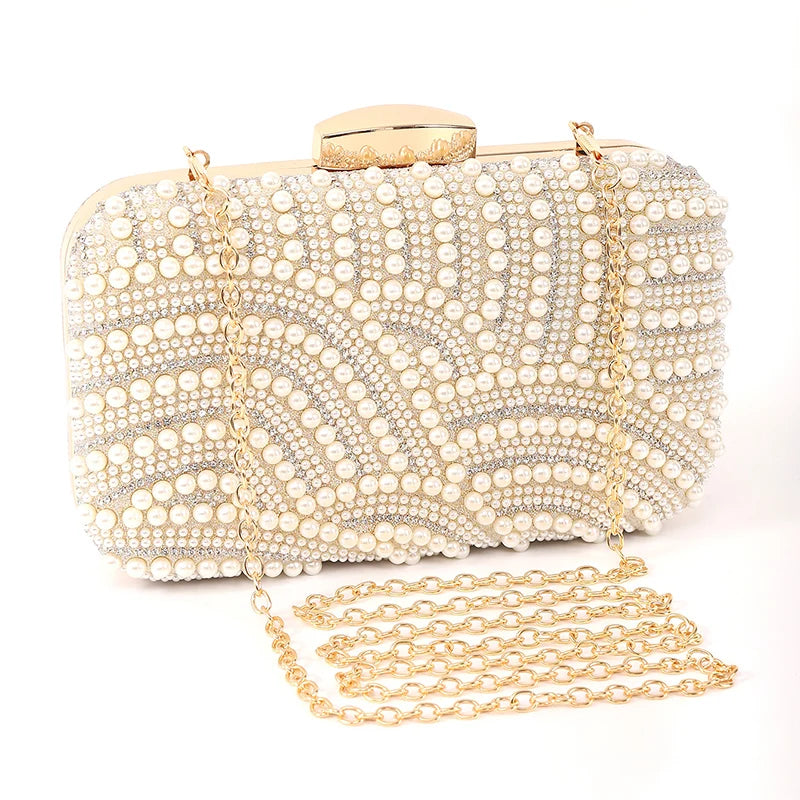 Cream pearl beaded evening clutch bag by Edenista with gold-tone chain strap