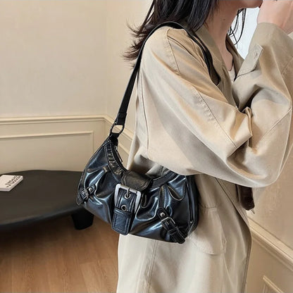 Hobo shoulder bag by Edenista in black with buckle straps