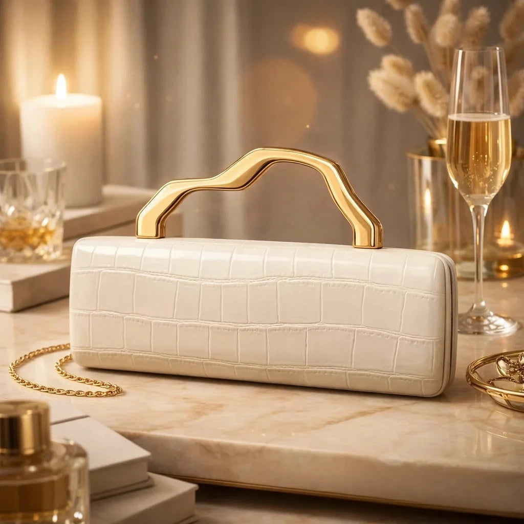 White crocodile-pattern PU evening clutch with gilded, shaped handle and chain strap