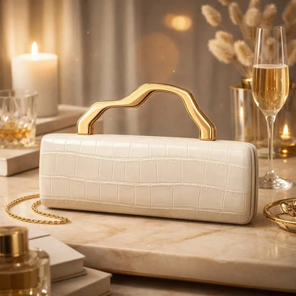 White crocodile-pattern PU evening clutch with gilded, shaped handle and chain strap