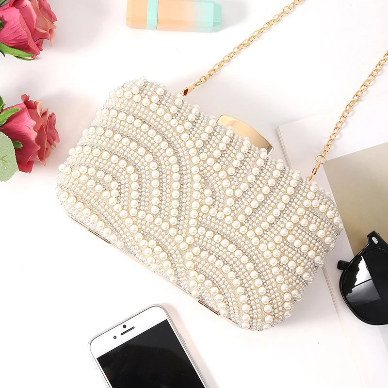Edenista pearl-embellished evening clutch with long gold chain, beaded ivory bag for weddings and parties.