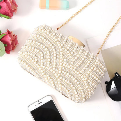 Edenista pearl-embellished evening clutch with long gold chain, beaded ivory bag for weddings and parties.