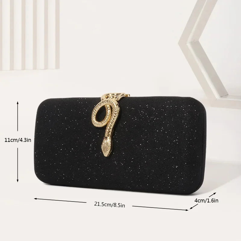 Classic snake-buckle evening purse; black glitter clutch with gold snake clasp, 21.5 cm wide, 11 cm high, 4 cm deep.