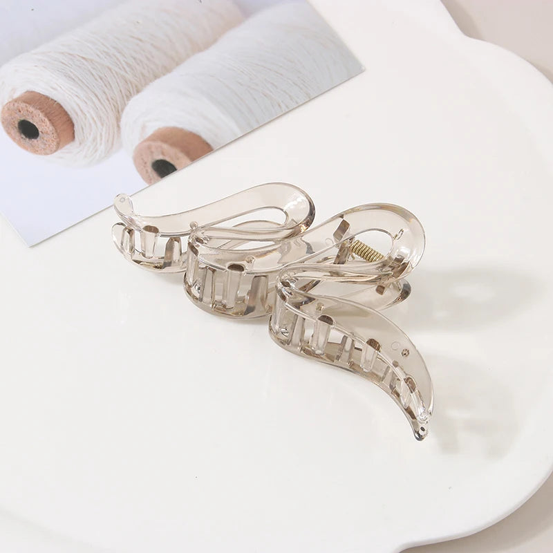 Set of 3 large clear acrylic hair claw clips with curved teeth