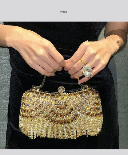 Gold-tone crystal-studded evening clutch bag with fringe tassel, a statement accessory for bridal parties and events