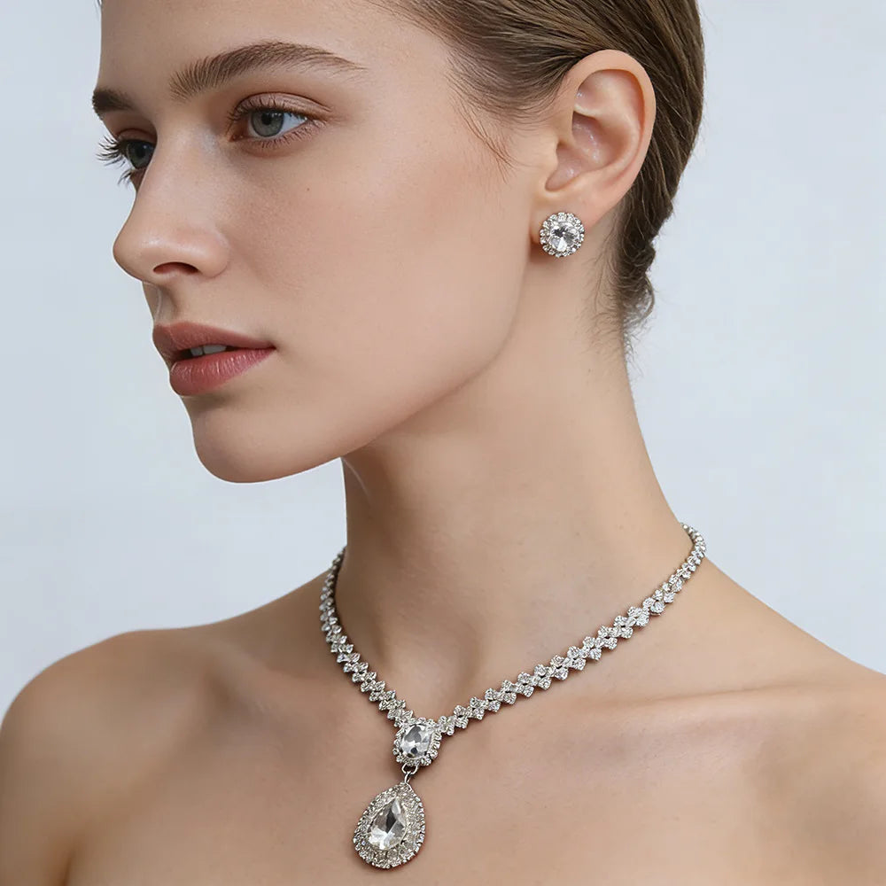 Diamond necklace and matching stud earrings, two-piece silver-tone teardrop pendant wedding jewelry set.