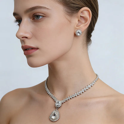 Diamond necklace and matching stud earrings, two-piece silver-tone teardrop pendant wedding jewelry set.