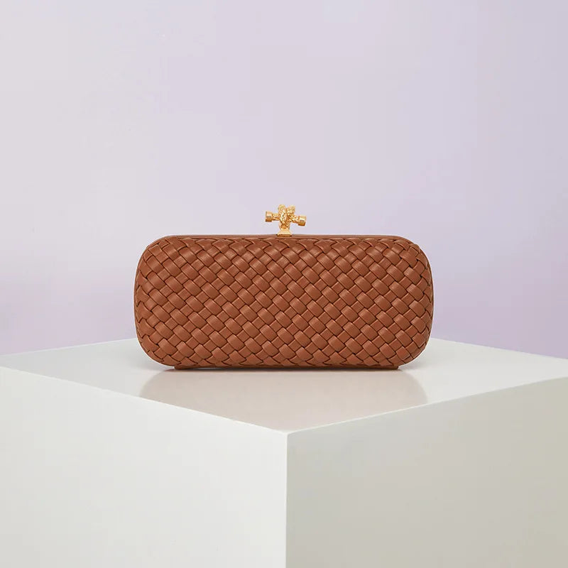 Brown woven PU crossbody bag with a gold-tone clasp.