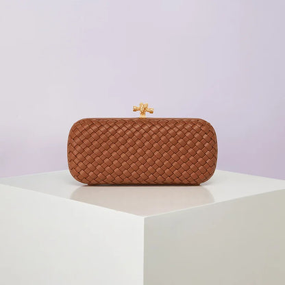 Brown woven PU crossbody bag with a gold-tone clasp.