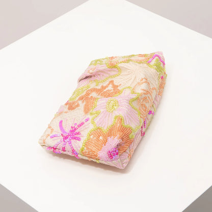 Edenista clutch bag with pastel floral embroidery and sequin accents