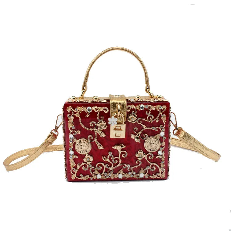 Edenista red velvet rhinestone evening clutch with gold-tone hardware, top handle and detachable strap