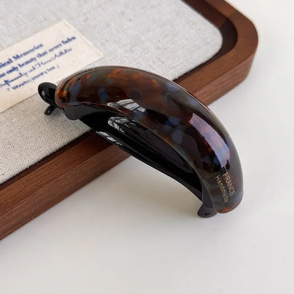 Barrette hair clip in tortoiseshell acetate; retro high-ponytail style, handmade.