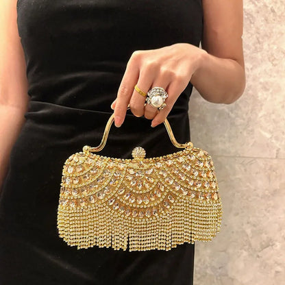 Diamond evening clutch bag in gold-tone with rhinestone embellishments and fringe tassel