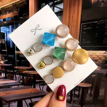 Geometric acrylic pearl hair clips set by Edenista; 9 assorted square, round and glitter barrettes