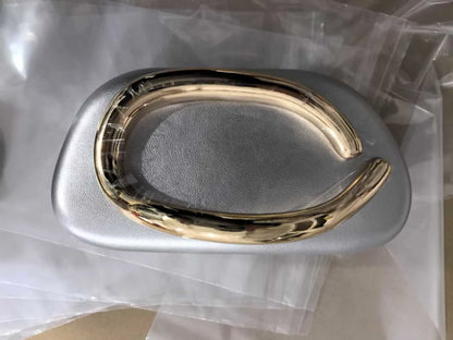 Gold metal-frame box clutch bag with metallic silver body, evening handbag.