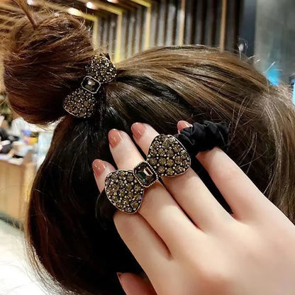 Rhinestone bow scrunchies for women and girls by Edenista; elastic black hair bands with sparkling bow accents