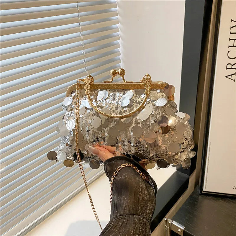 Sequined evening shoulder bag, silver with gold frame and chain strap