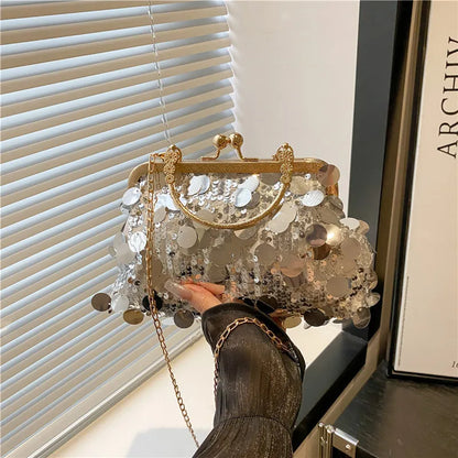 Sequined evening shoulder bag, silver with gold frame and chain strap