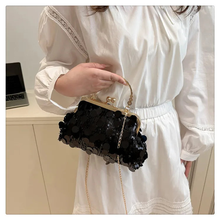 Edenista black sequined evening shoulder bag with gold frame and chain crossbody strap